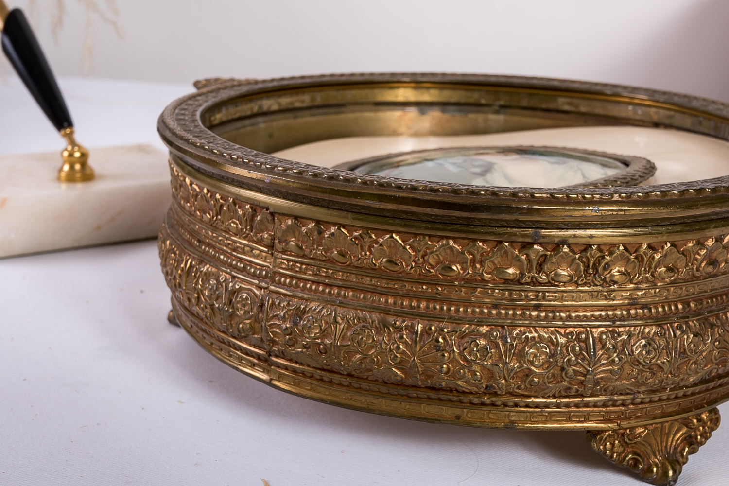 Feather Pens and Brass-Toned Bowl
