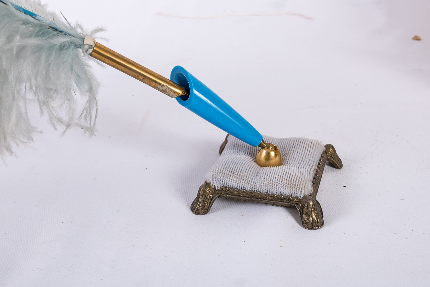 Feather Pens and Brass-Toned Bowl