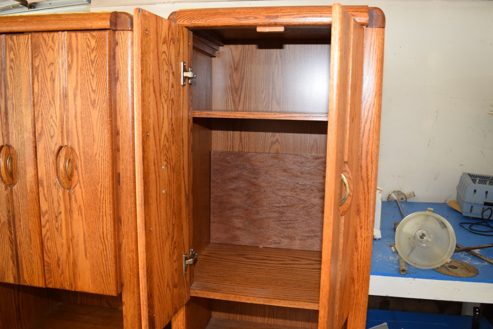 Pair of Tall Oak Storage Cabinets