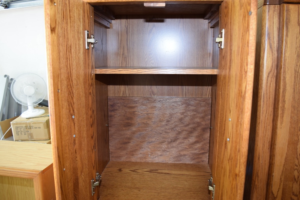 Pair of Tall Oak Storage Cabinets