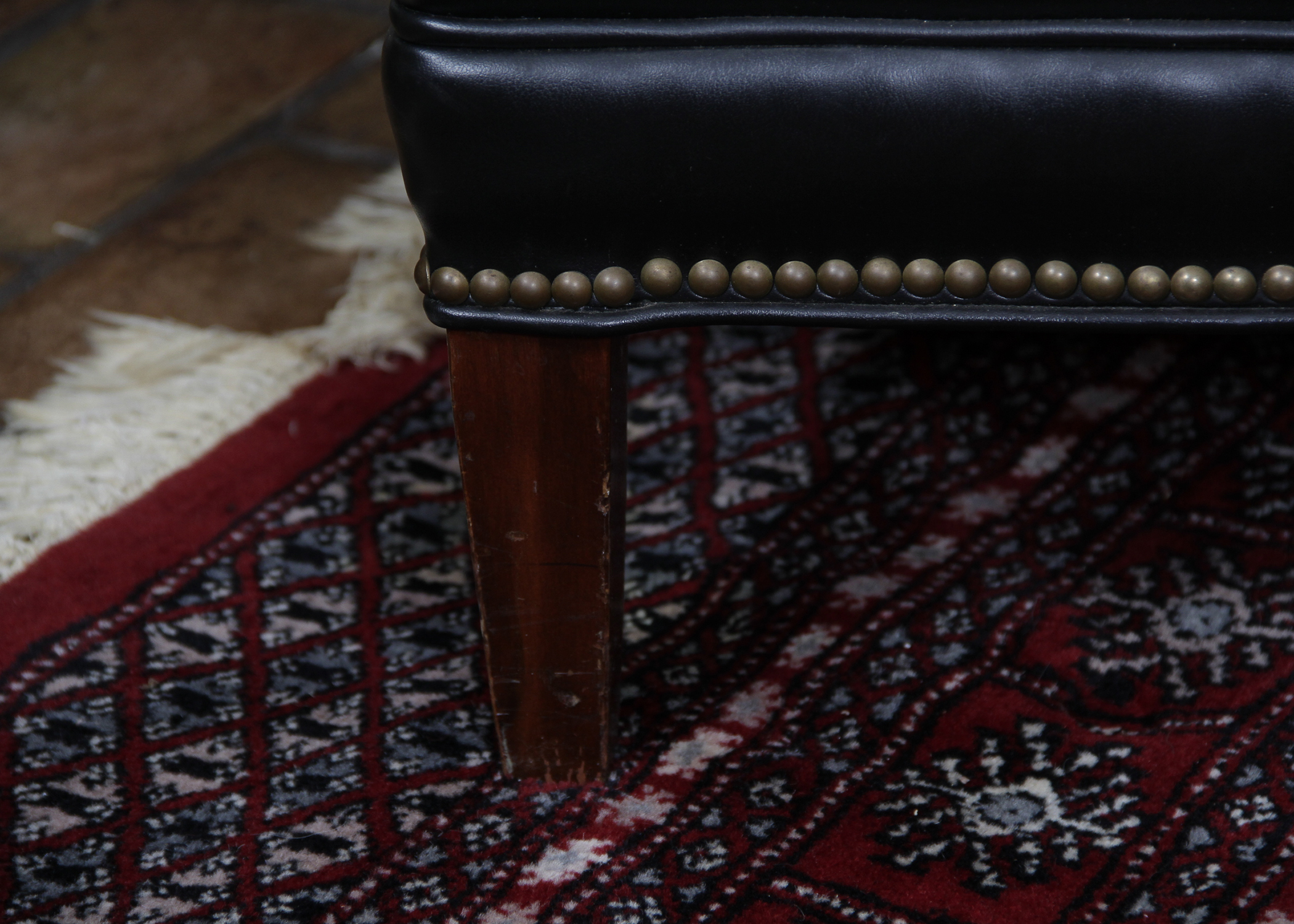 Black Vinyl Wingback Chair