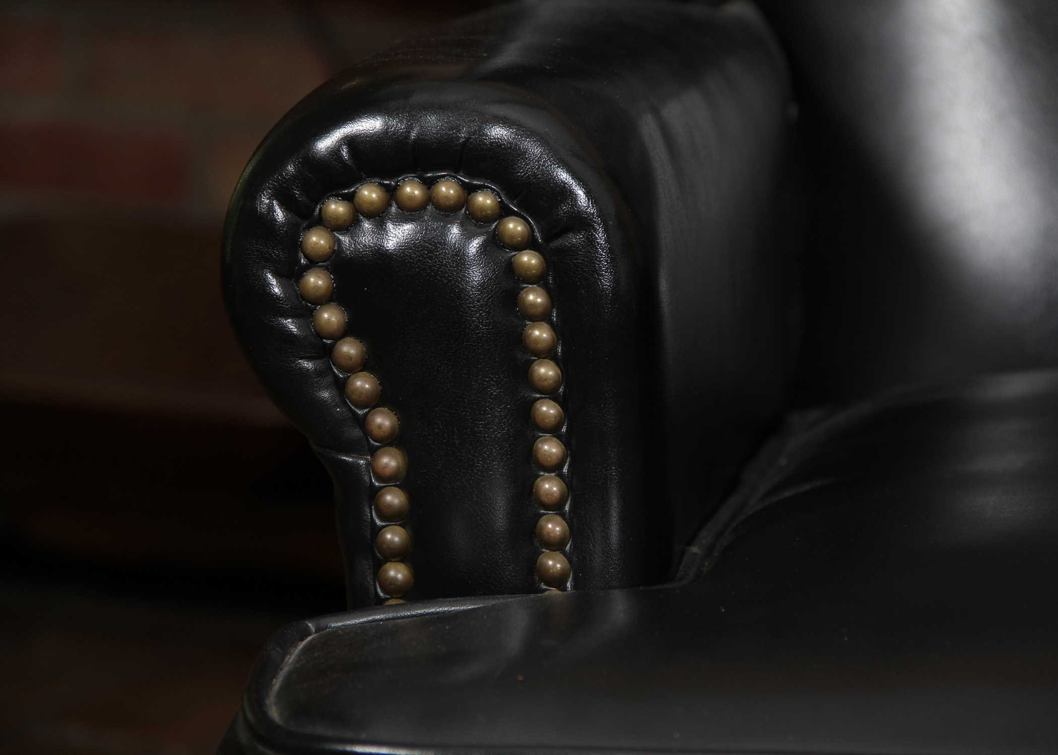 Black Vinyl Wingback Chair