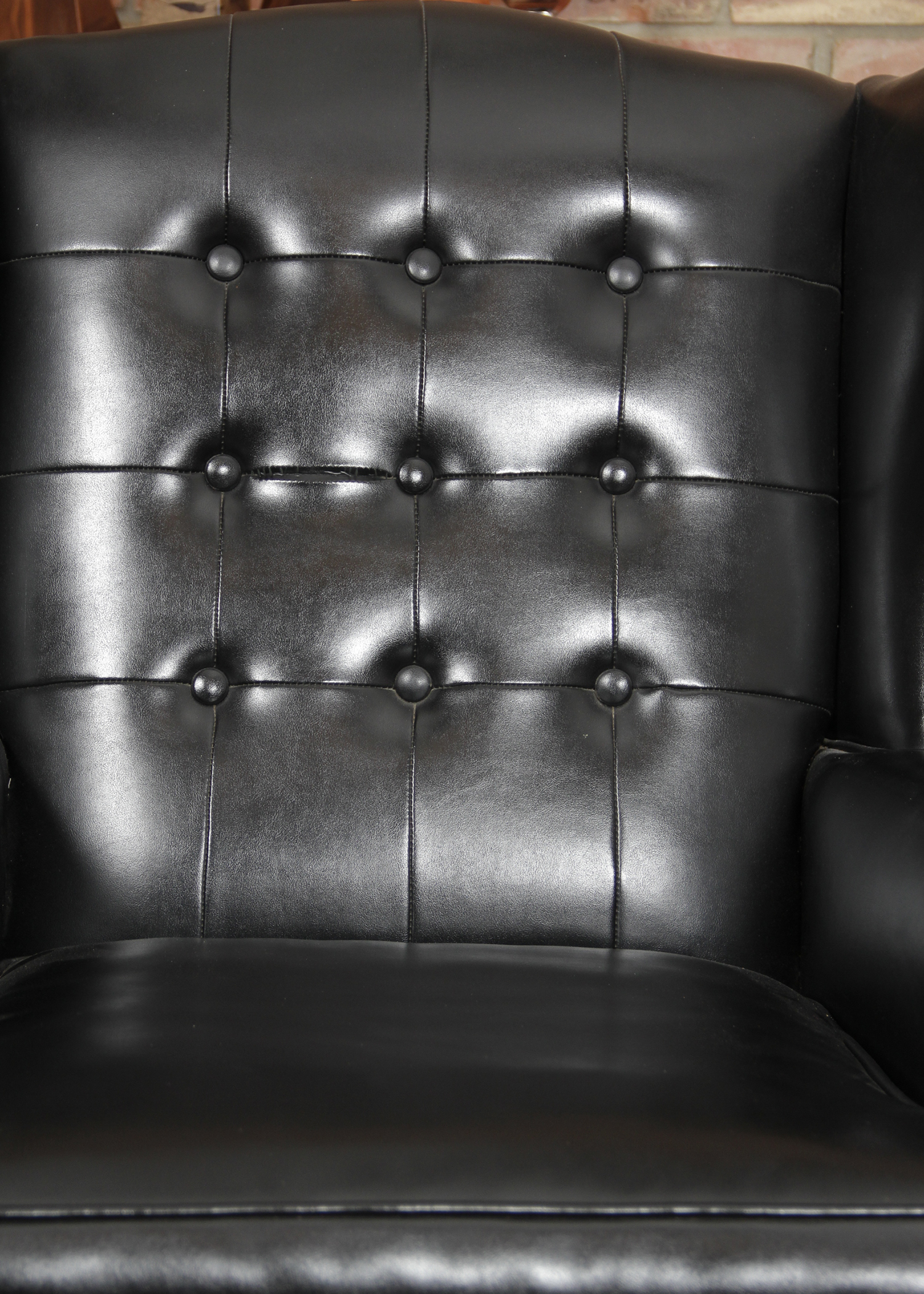 Black Vinyl Wingback Chair