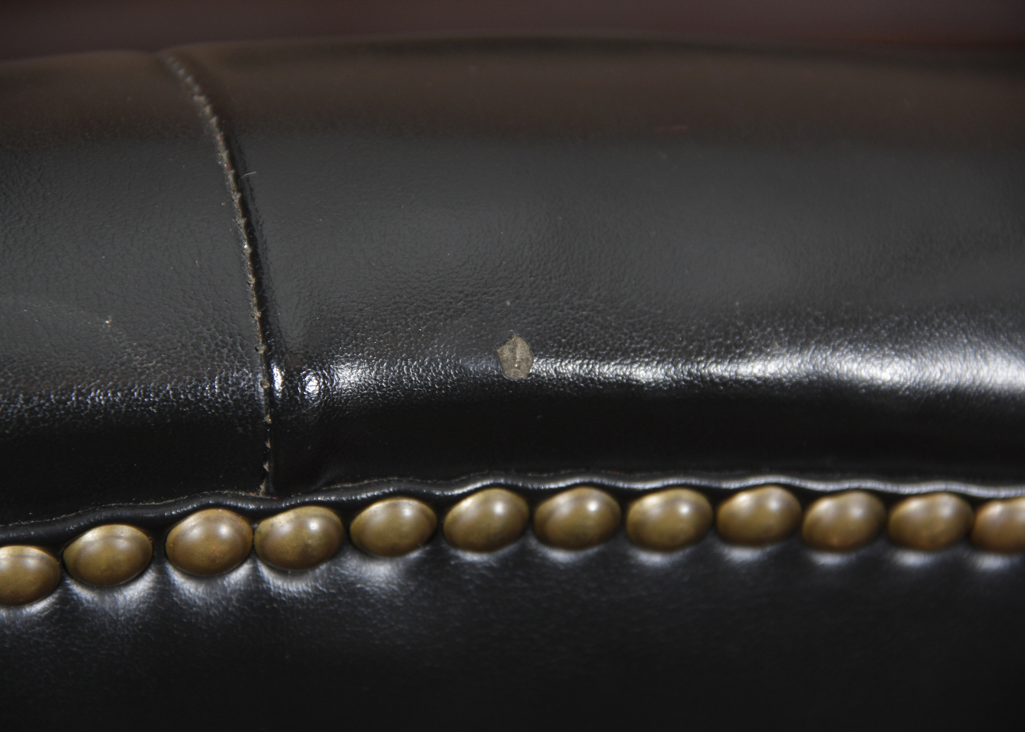 Black Vinyl Wingback Chair