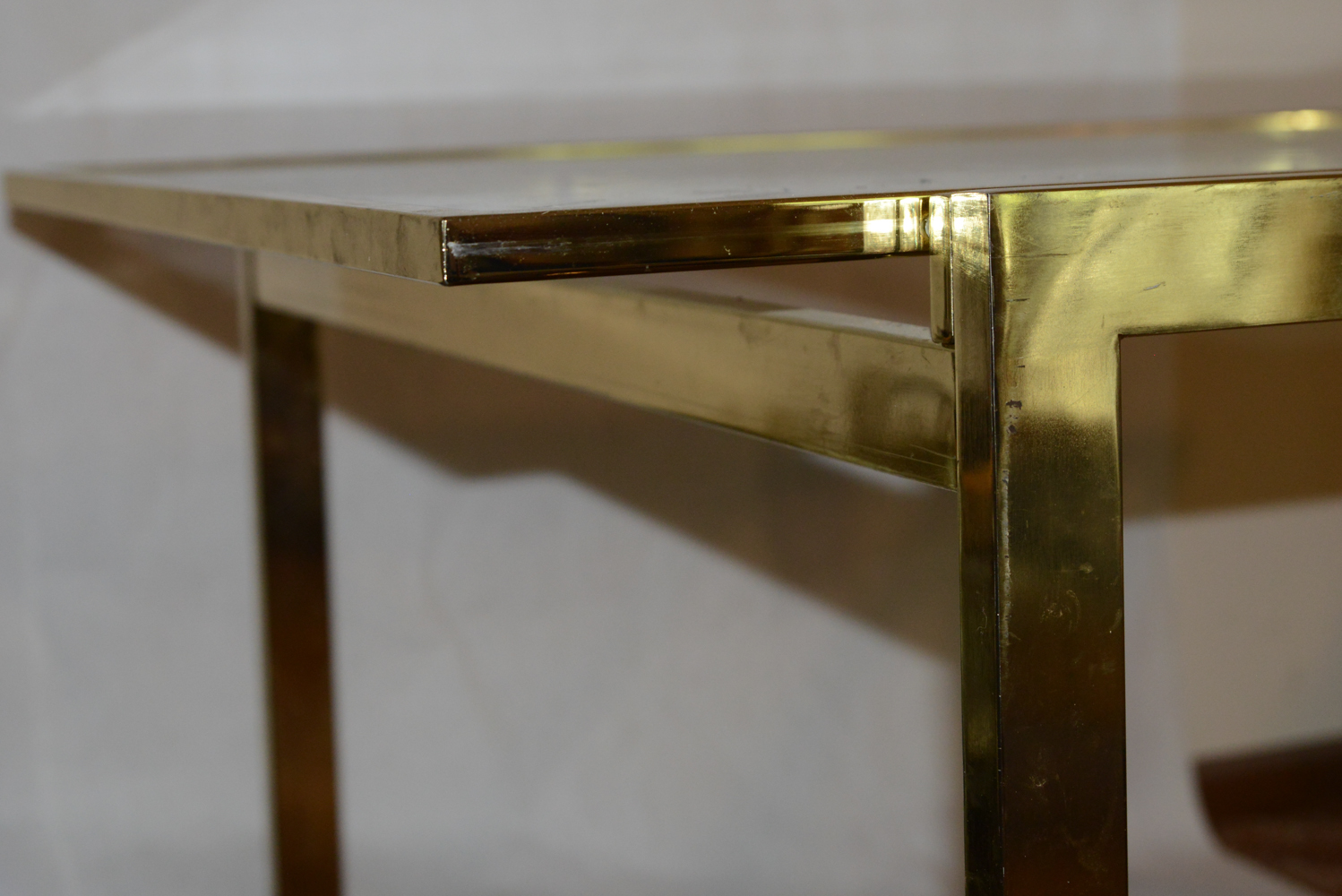 Modern Brass-Tone Dining Table with Glass Top