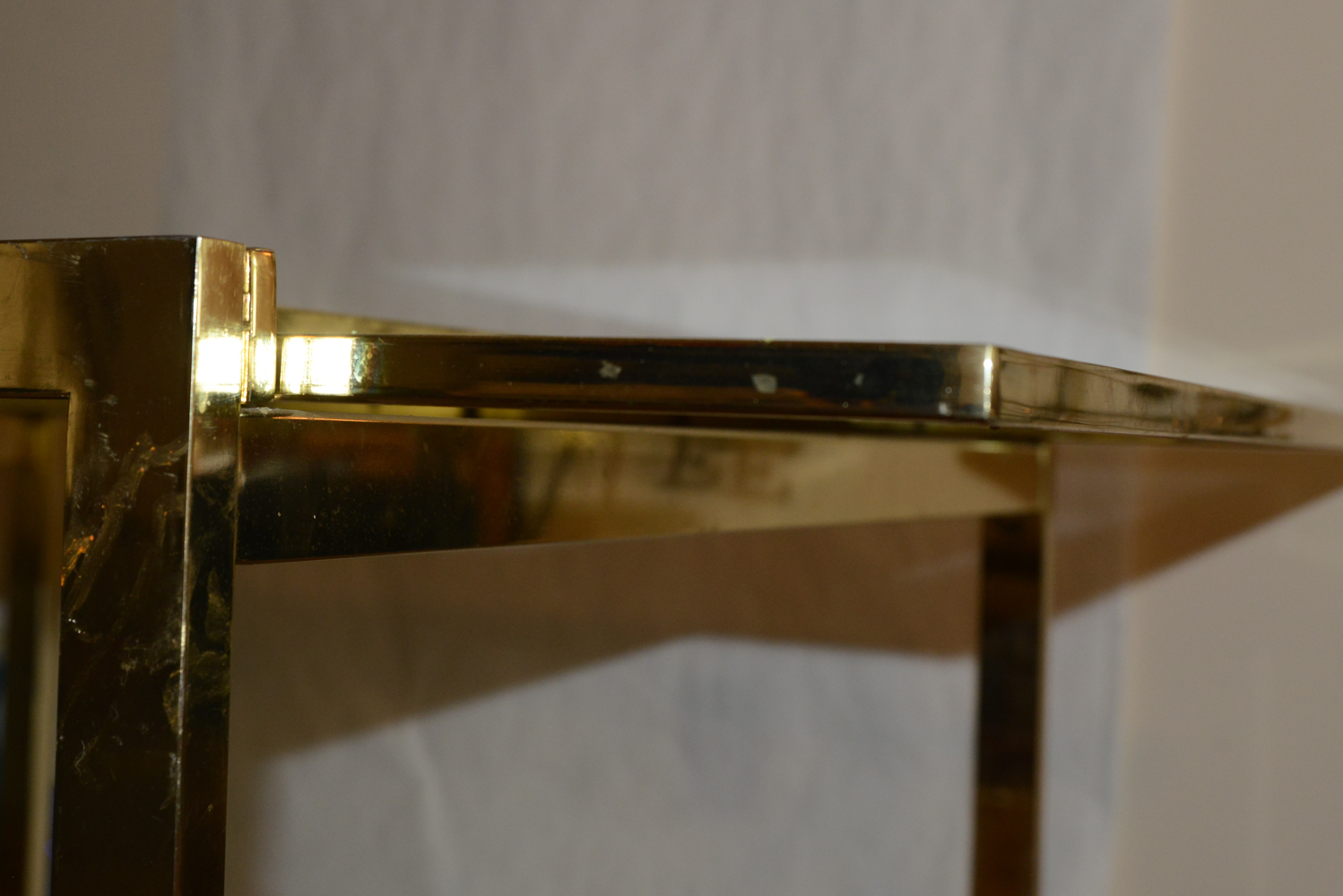 Modern Brass-Tone Dining Table with Glass Top