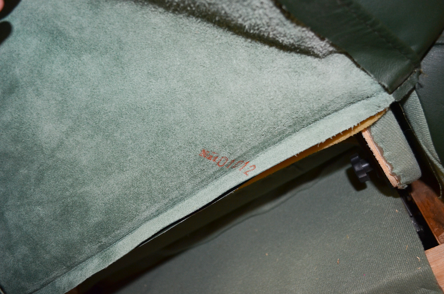 Natuzzi Dark Green Leather Swivel Rocker Recliner