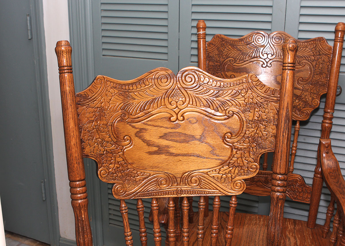 Four Oak Spindle Back Dining Chairs