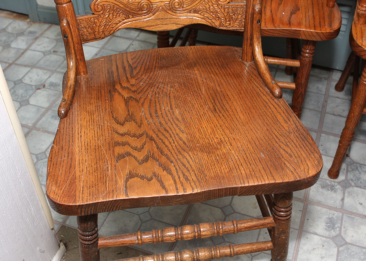 Four Oak Spindle Back Dining Chairs