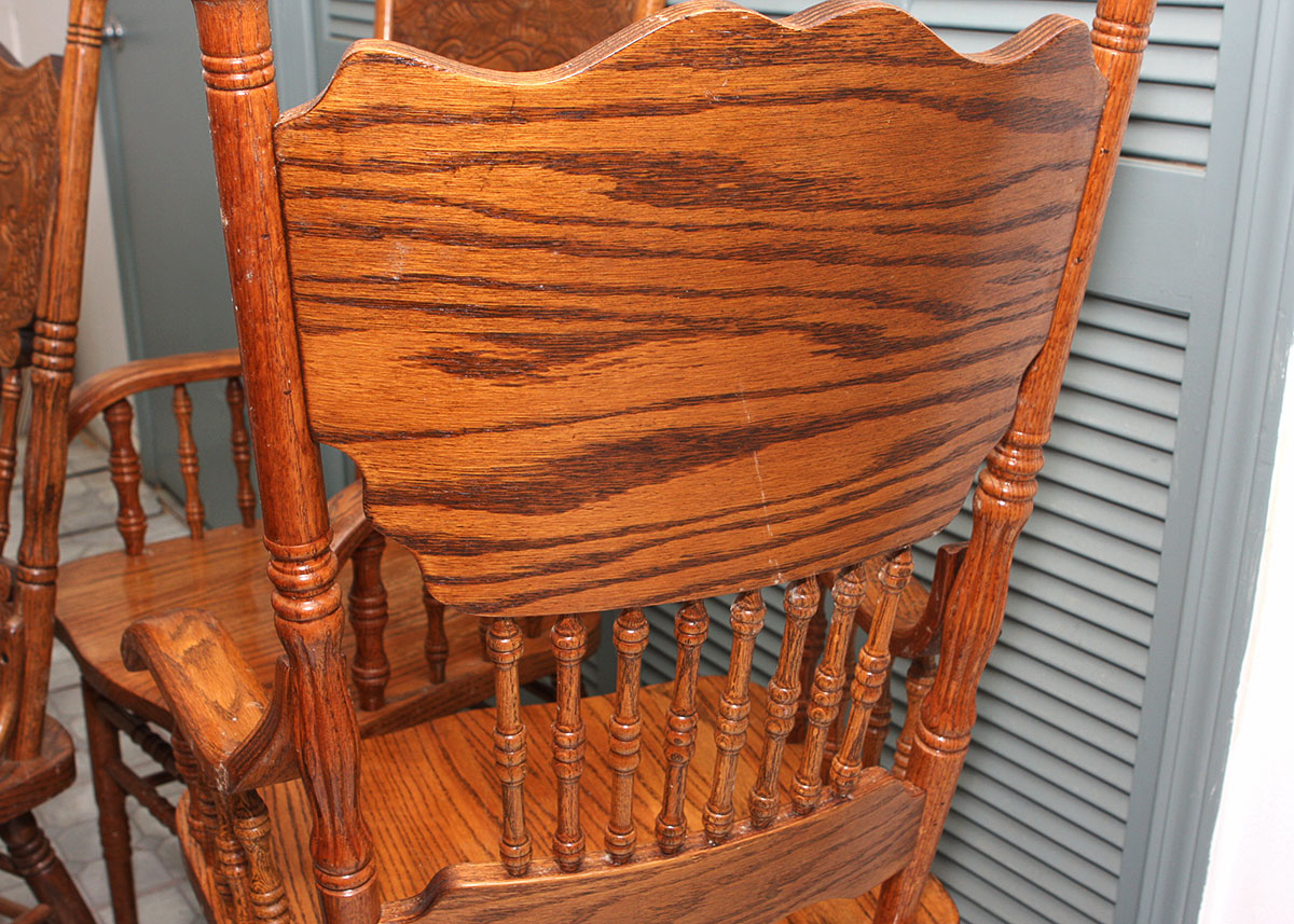 Four Oak Spindle Back Dining Chairs