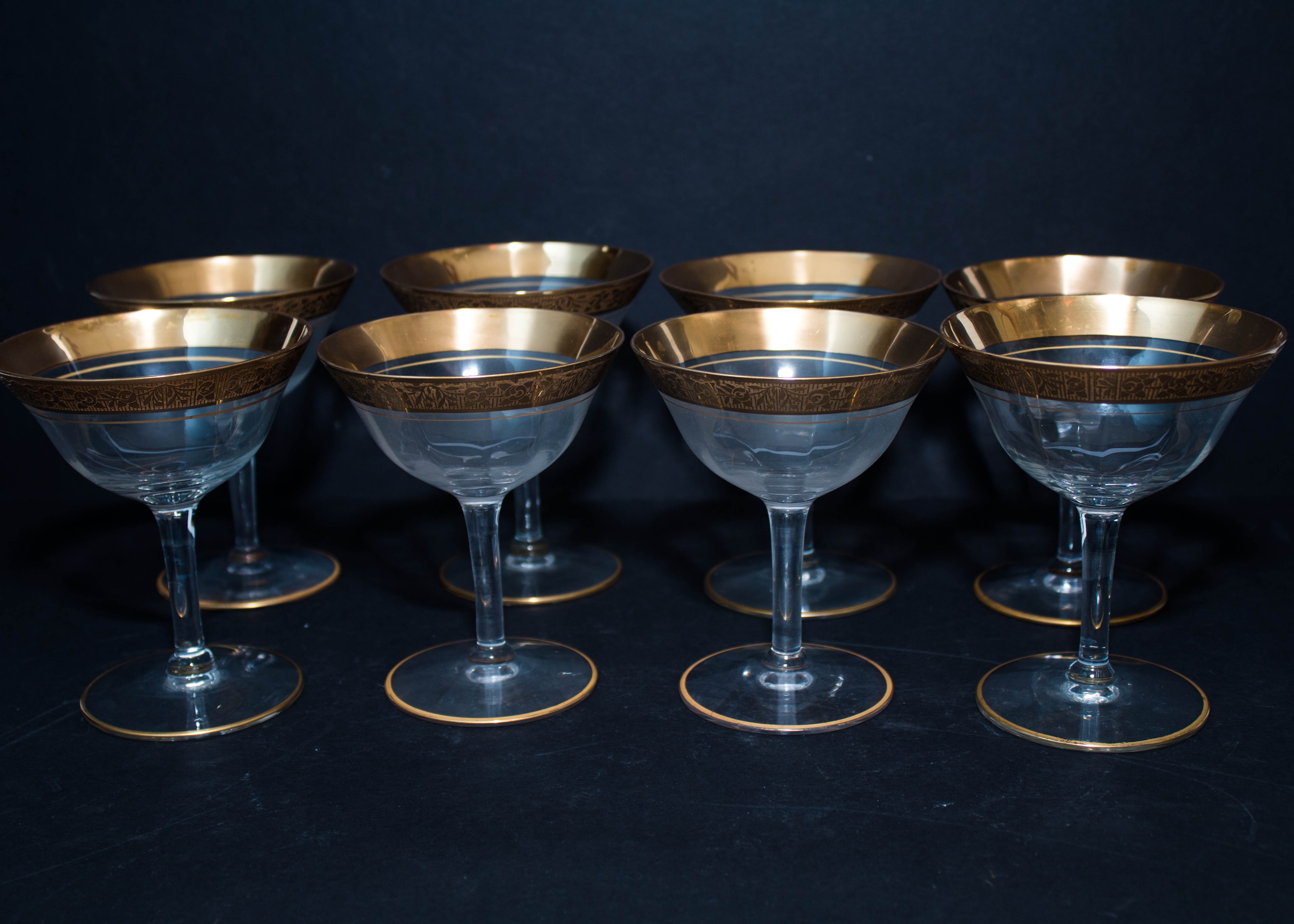 Eight Gold Trimmed Champagne Glasses