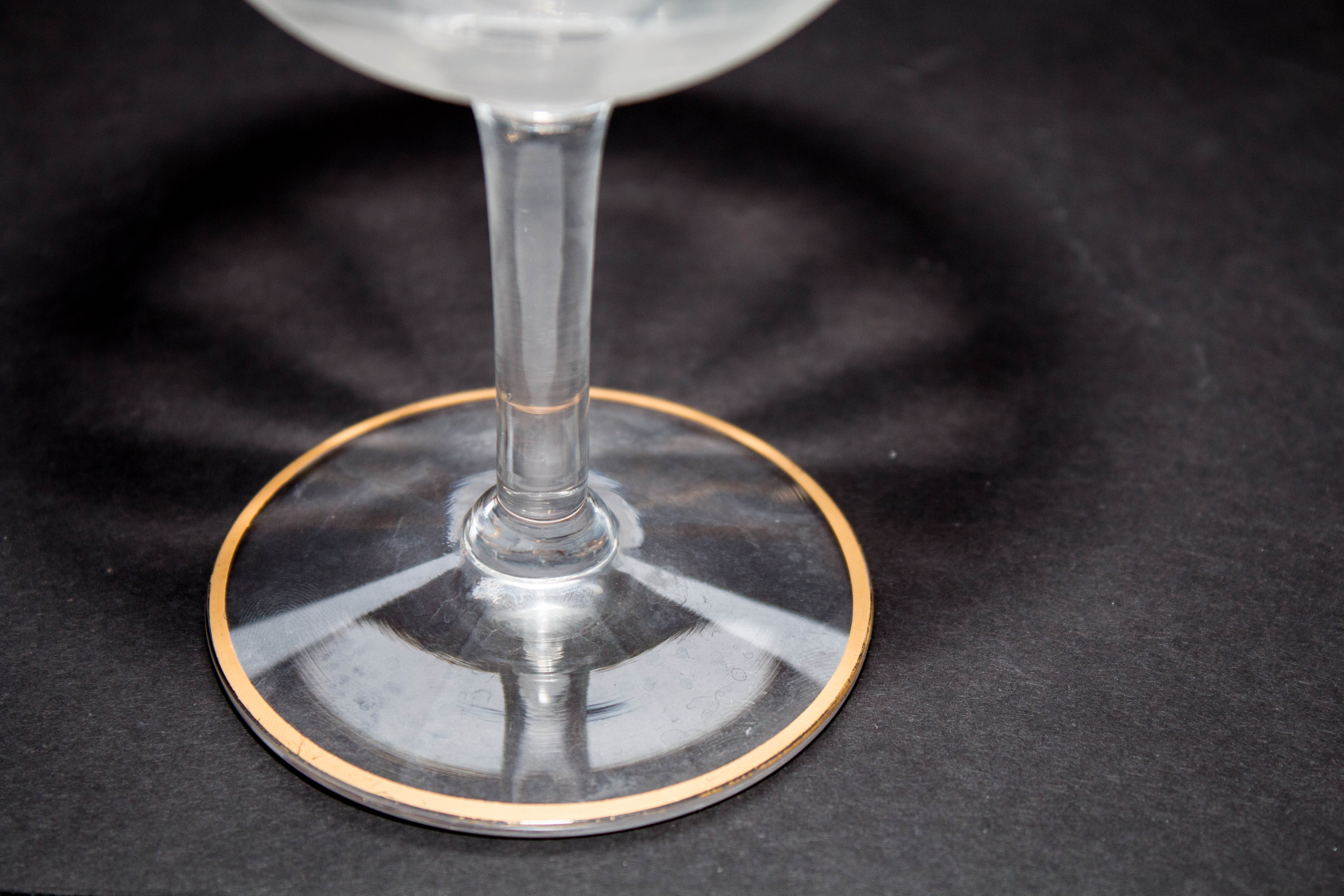 Eight Gold Trimmed Champagne Glasses