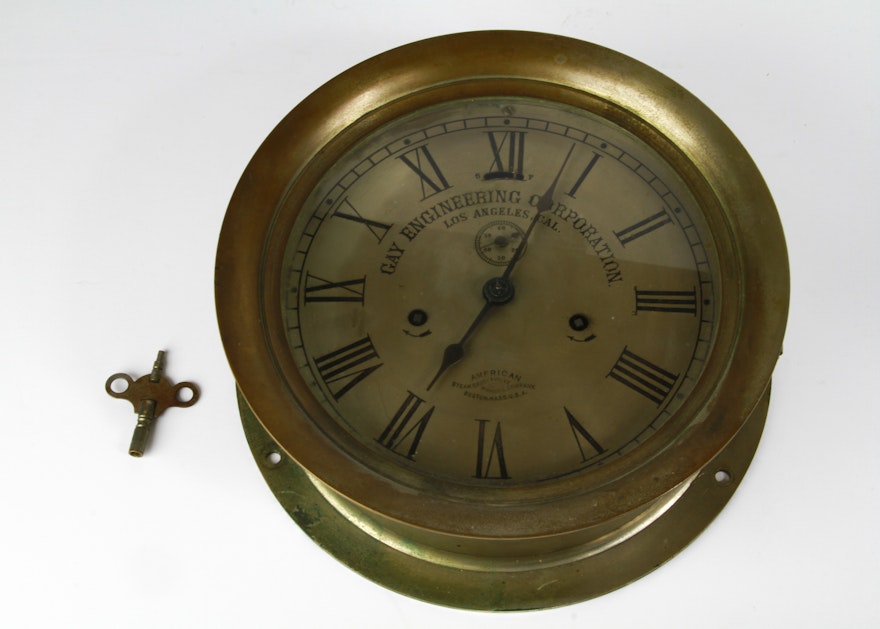 Antique Brass Turn Key Wall Clock