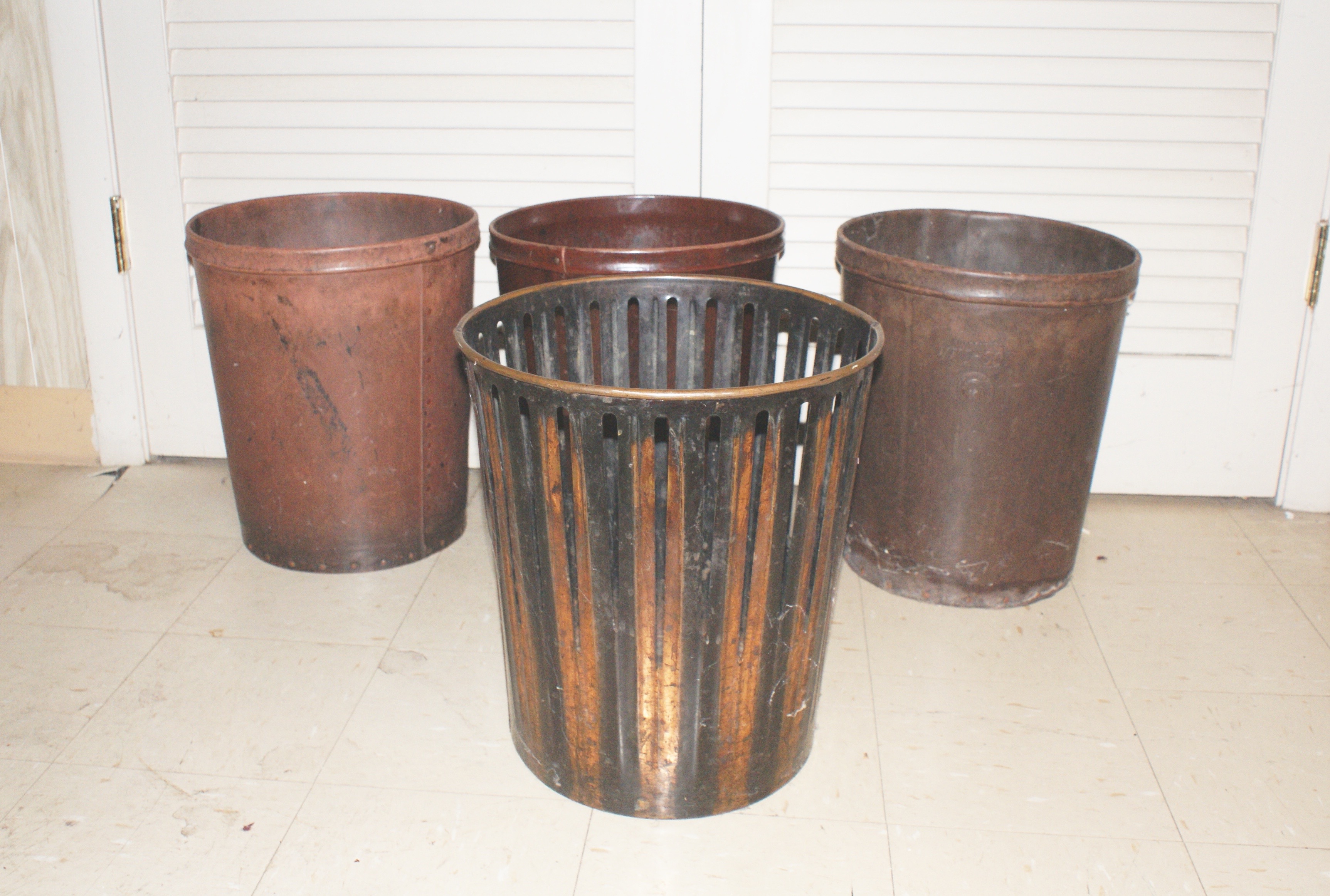 Collection of Four Antique Trash Cans