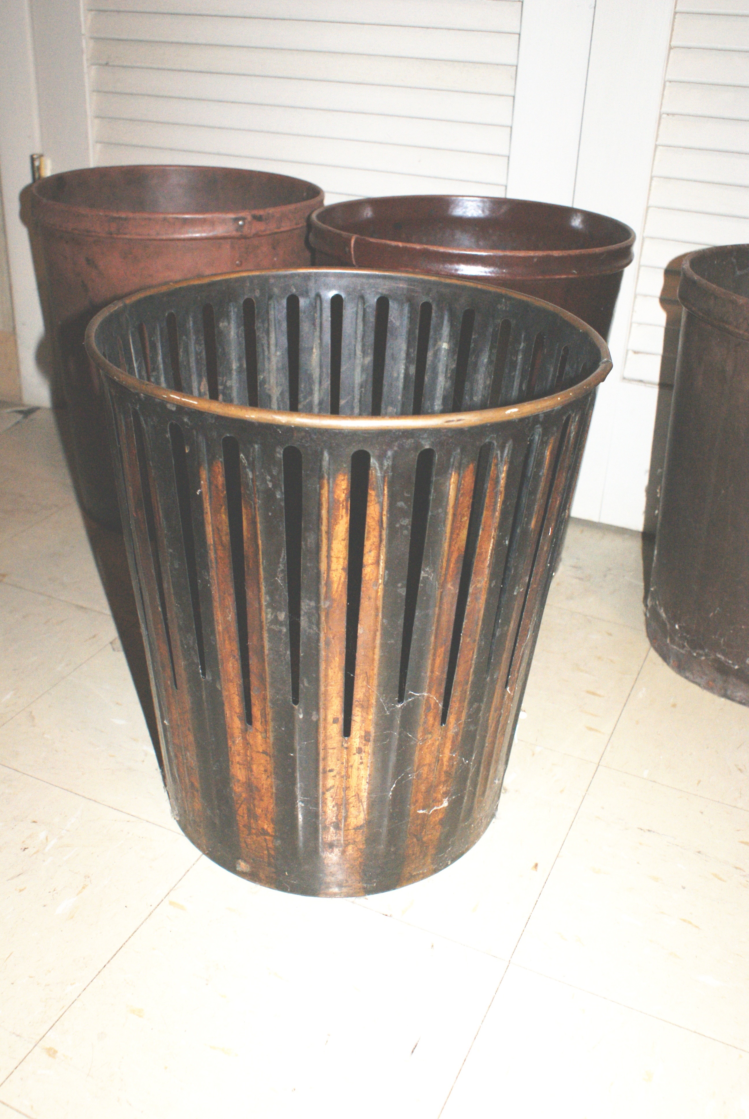 Collection of Four Antique Trash Cans