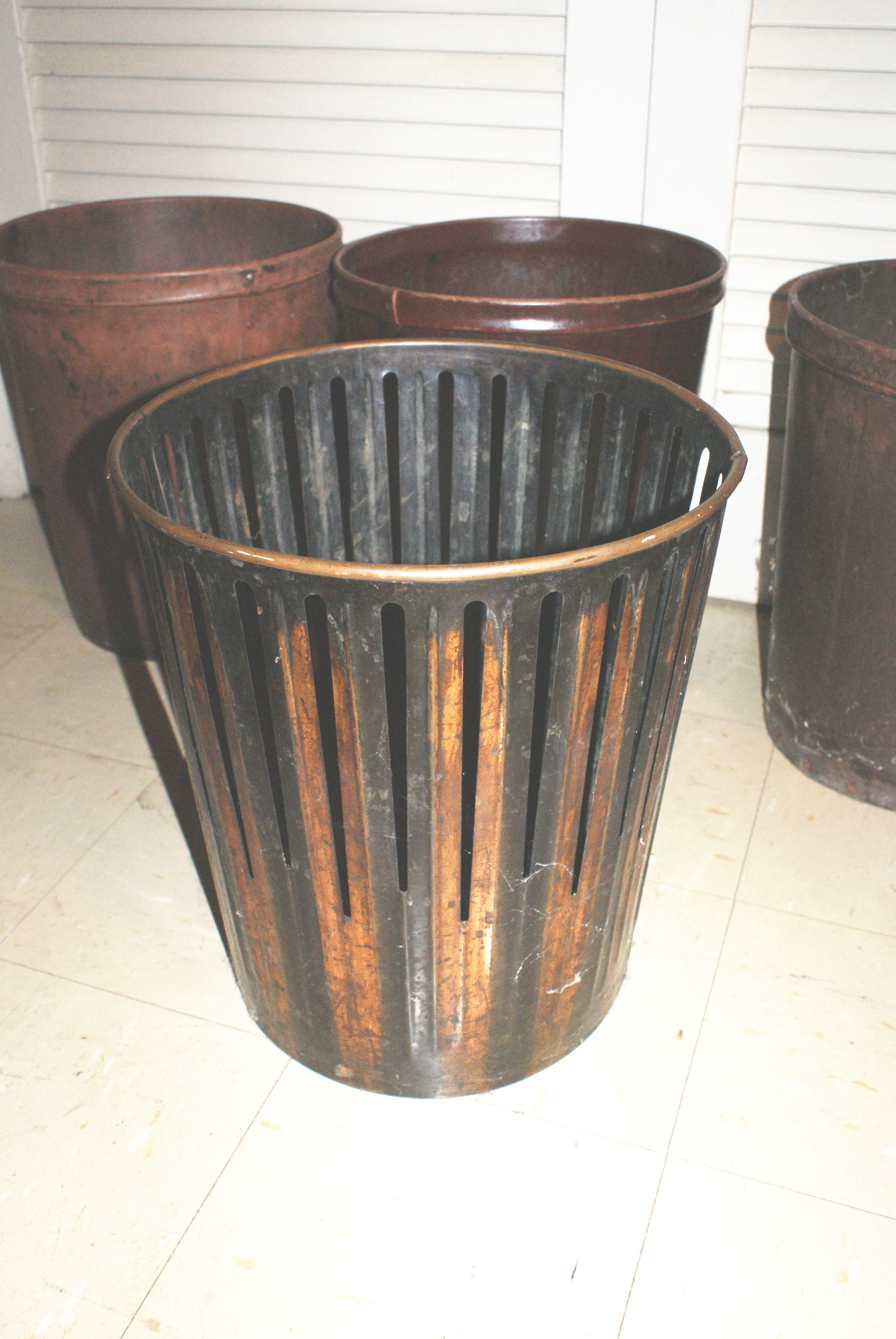 Collection of Four Antique Trash Cans