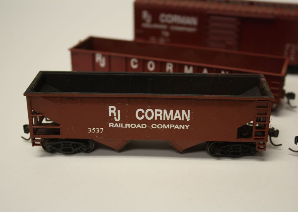 Collection of RJ Corman Model Train Cars