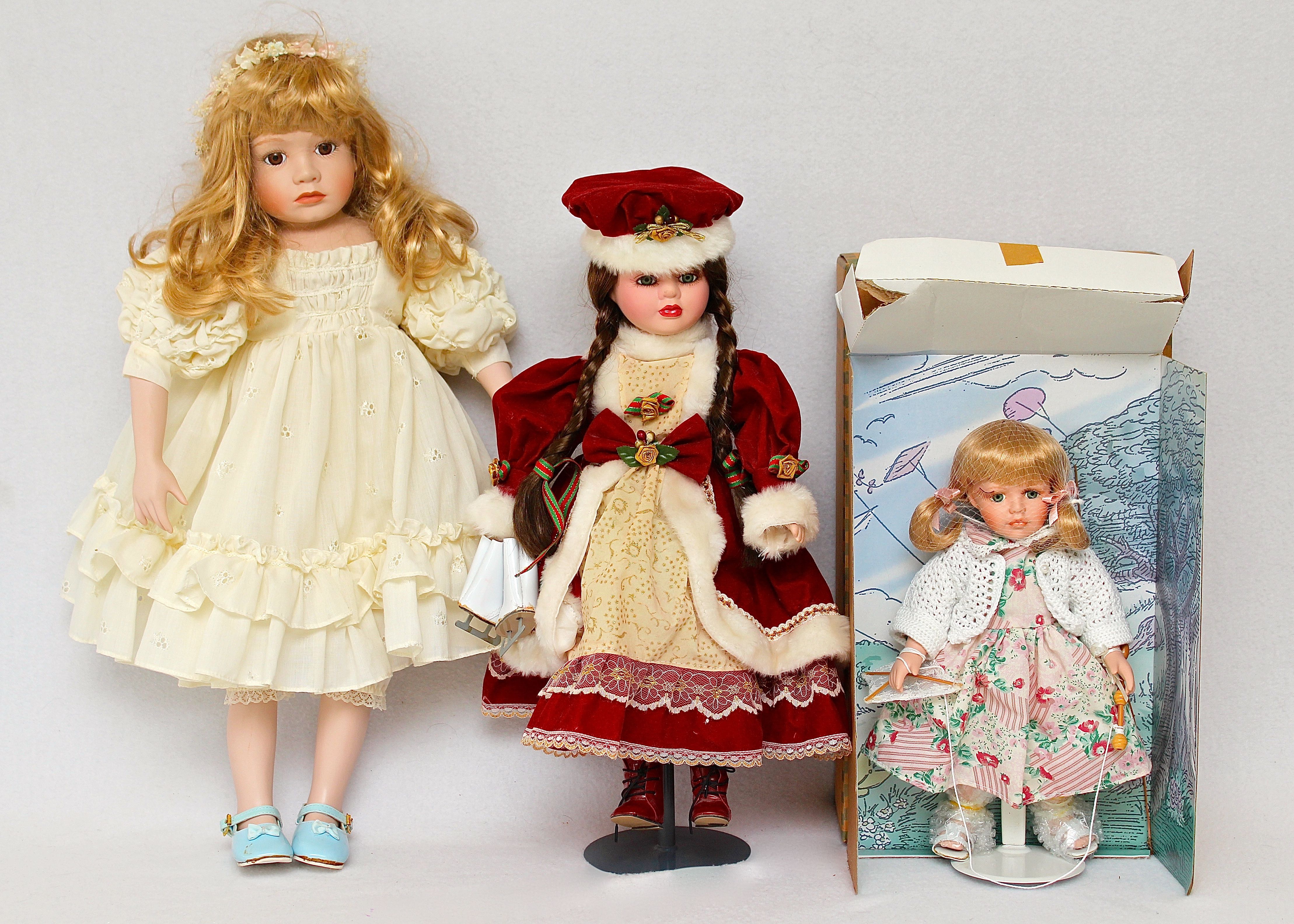 Porcelain Holiday Lane Doll with Two Other Dolls