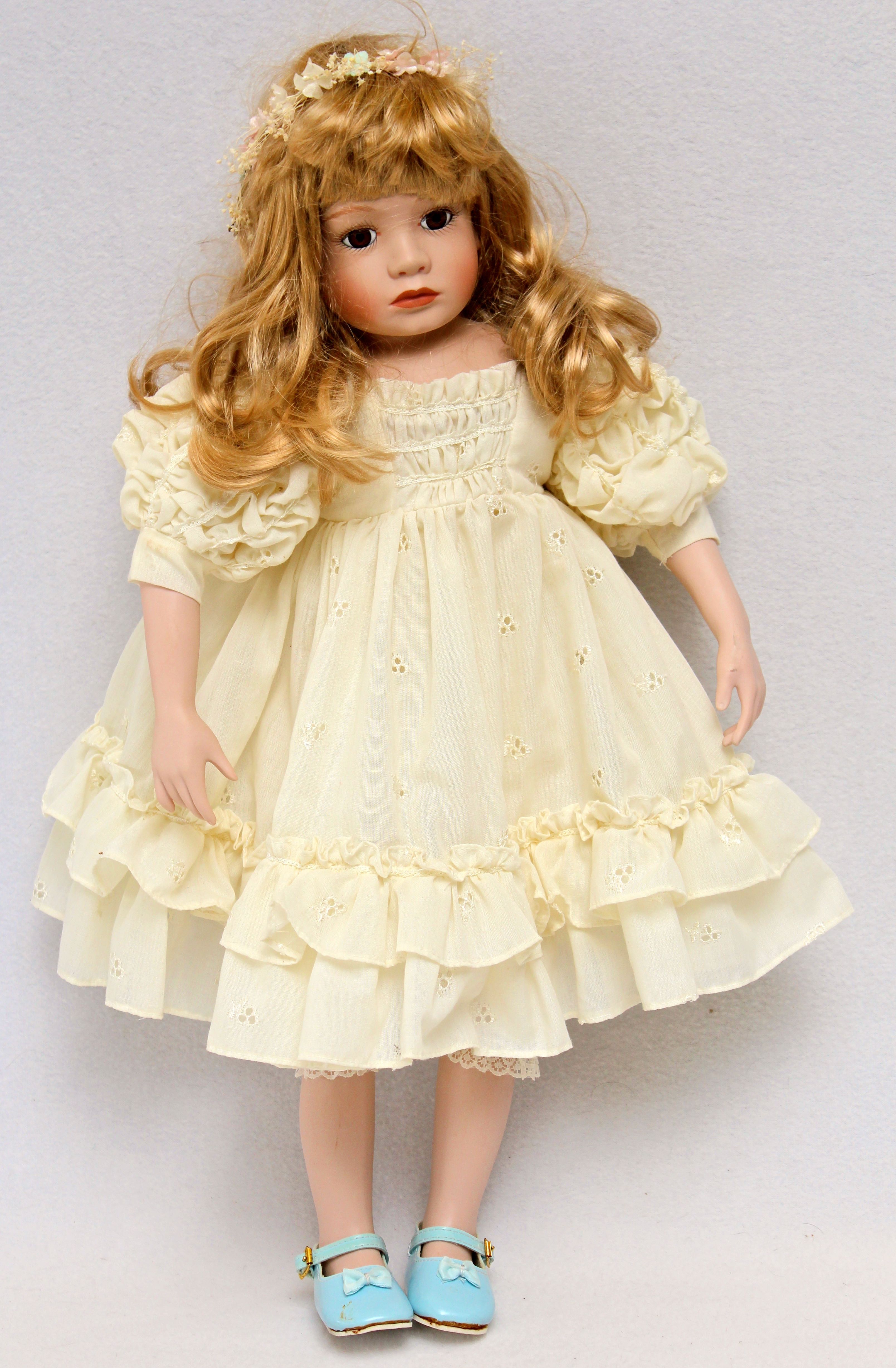 Porcelain Holiday Lane Doll with Two Other Dolls