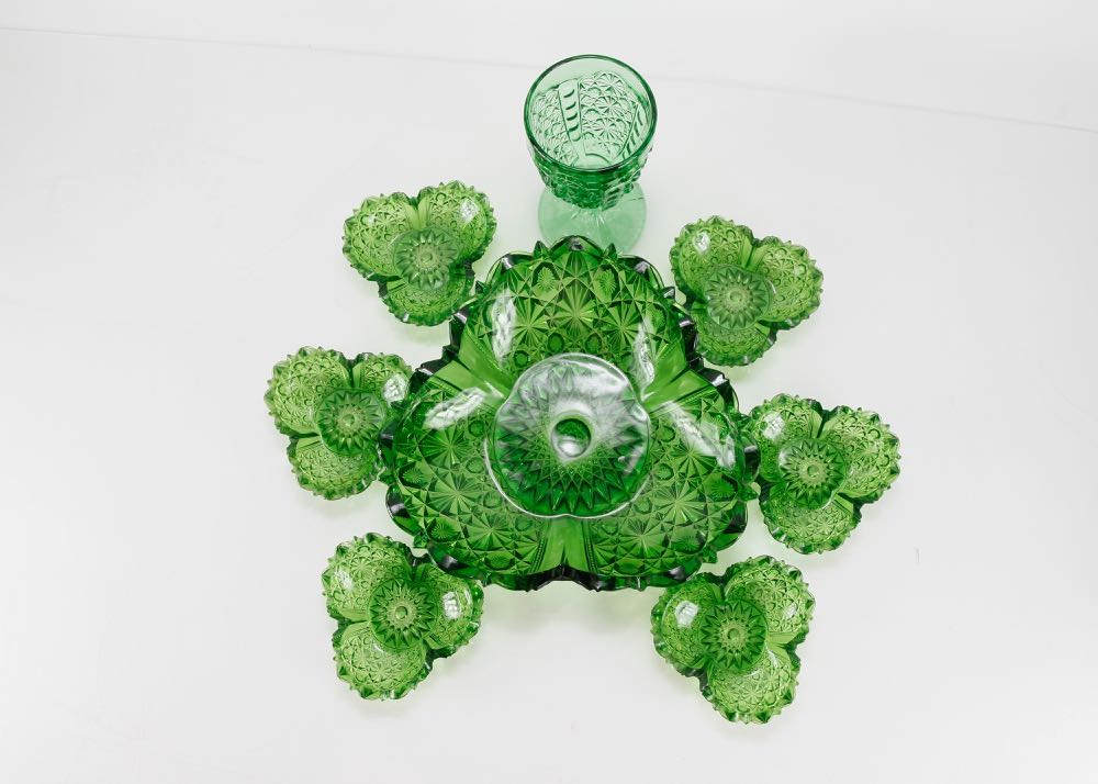 A Group of Dark Green Depression Glass