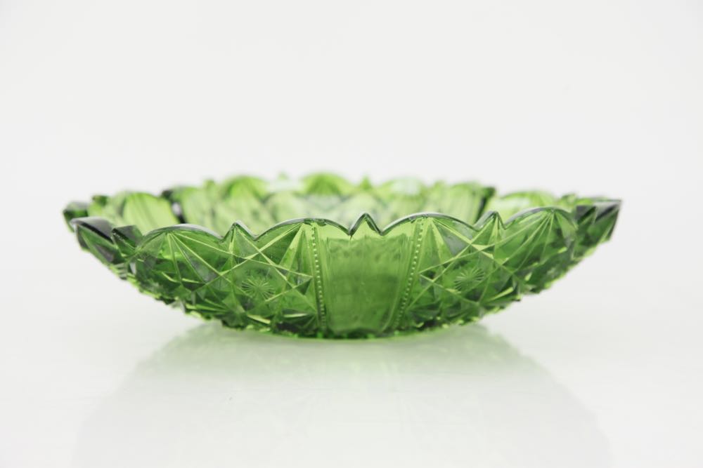 A Group of Dark Green Depression Glass