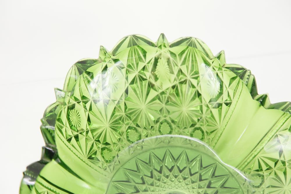 A Group of Dark Green Depression Glass