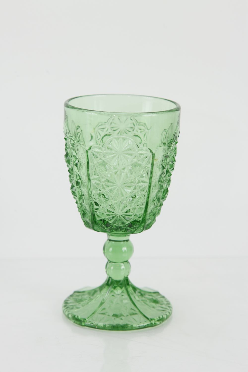 A Group of Dark Green Depression Glass