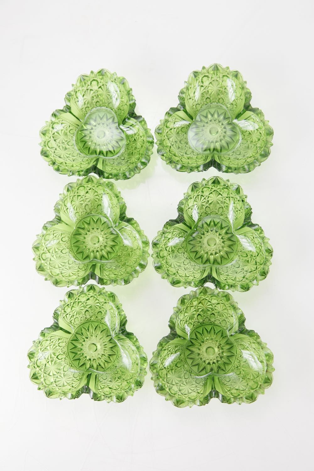 A Group of Dark Green Depression Glass