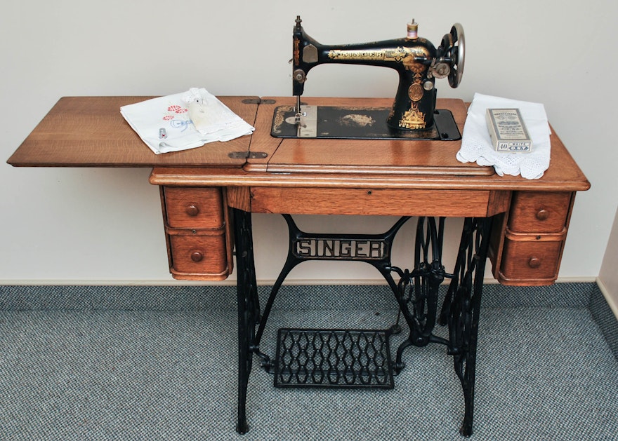 Antique Singer Sewing Machine with Cabinet