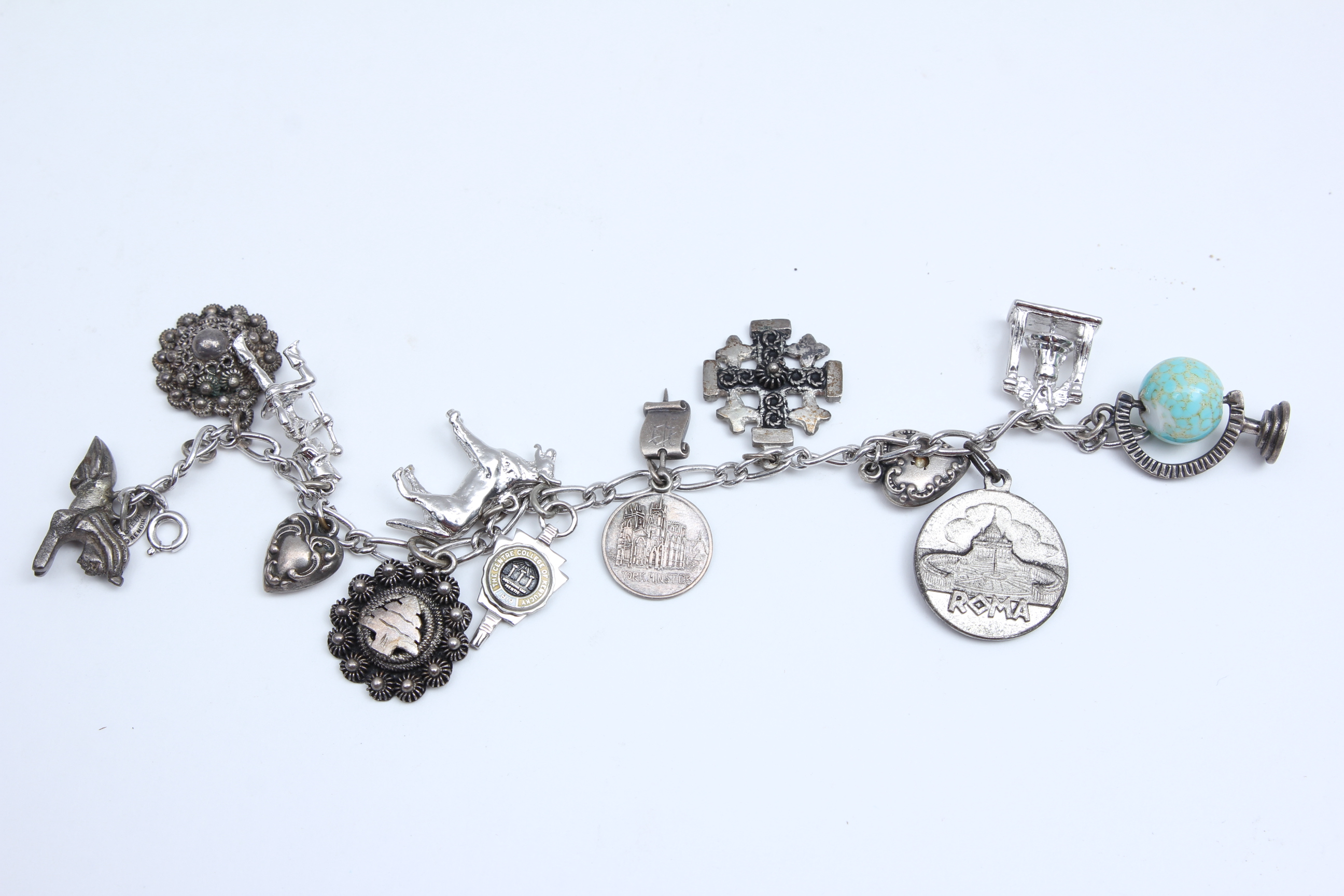 Sterling Silver Charms and Bracelets