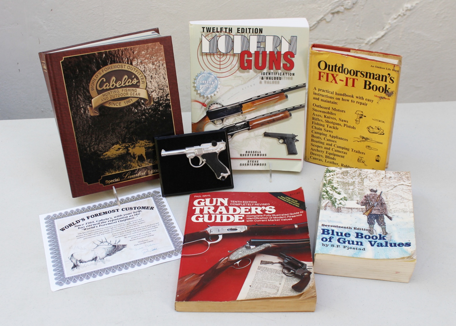 Gun Collector Books and Luger Plaque