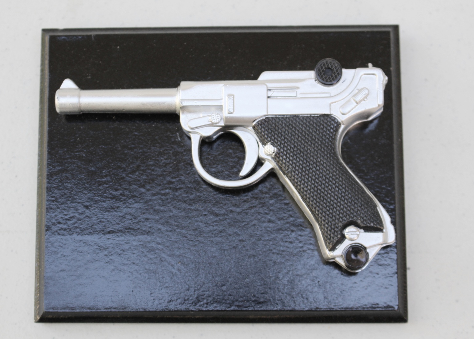 Gun Collector Books and Luger Plaque