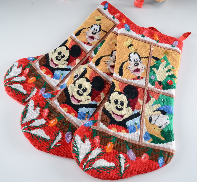 Collection of Disney Christmas Stocking and Stocking Holders