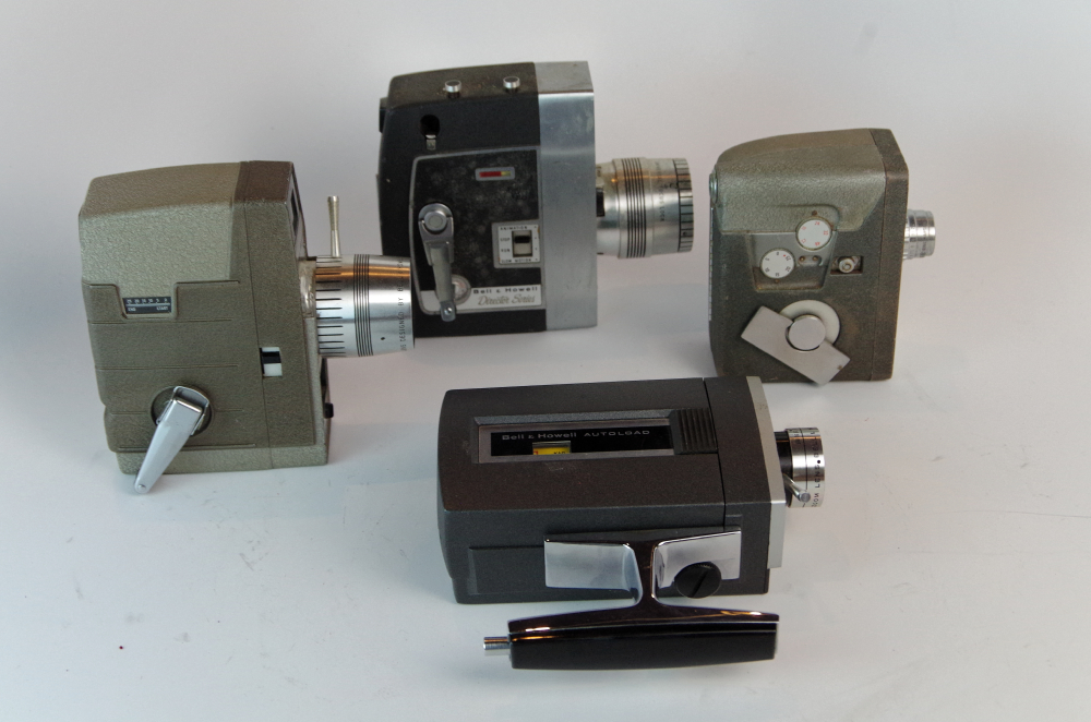 Four Vintage Handheld Movie Cameras Mostly Bell & Howell