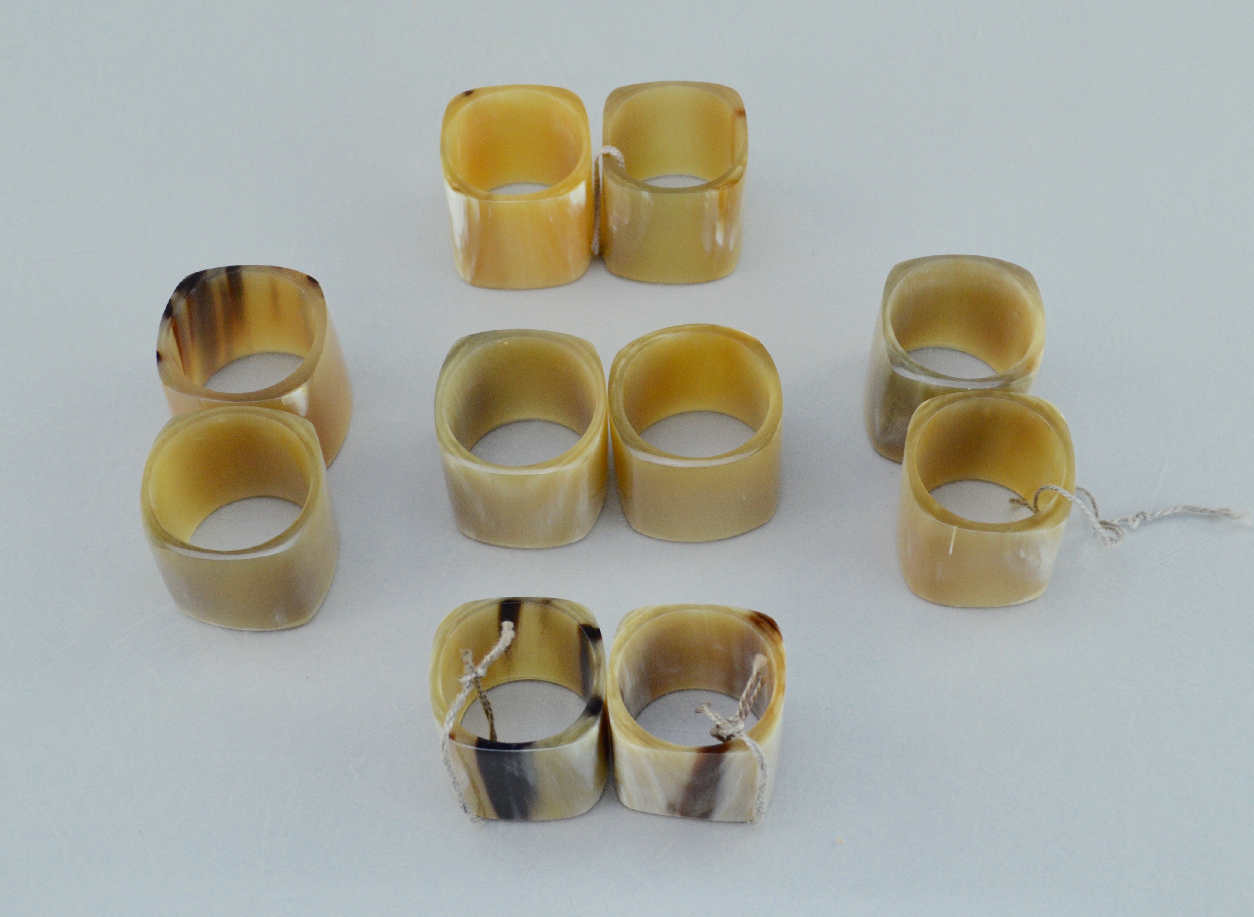 Acacia plates and Ten Faux Tortoise Napkin Holders