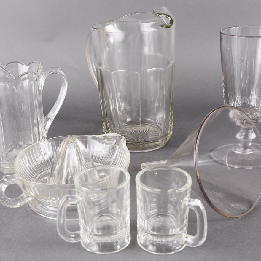 Vintage Pressed Glass Pitchers, Mugs, a Juicer, and a Funnel