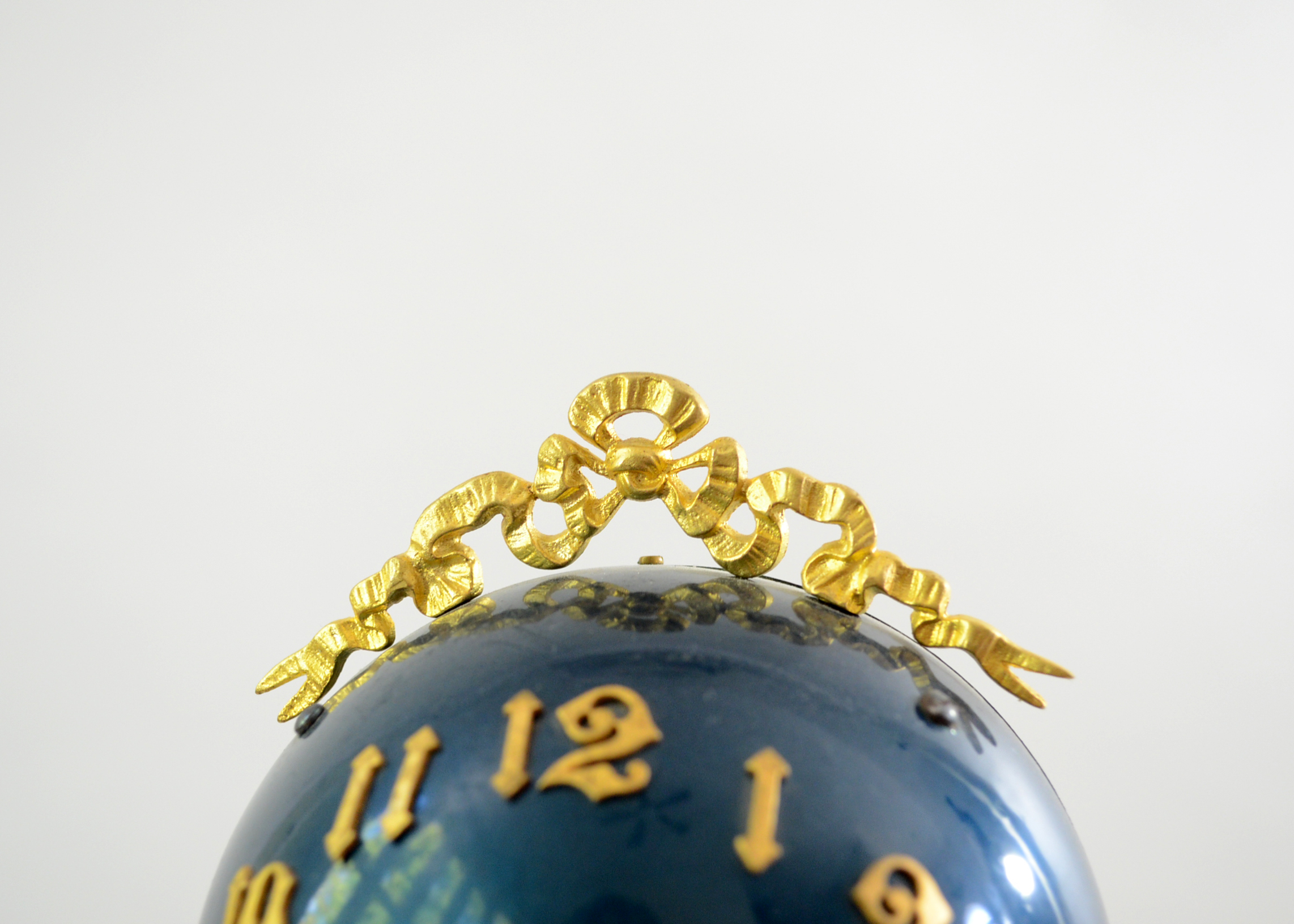 Double Swing Arm Clock Featuring Two Women