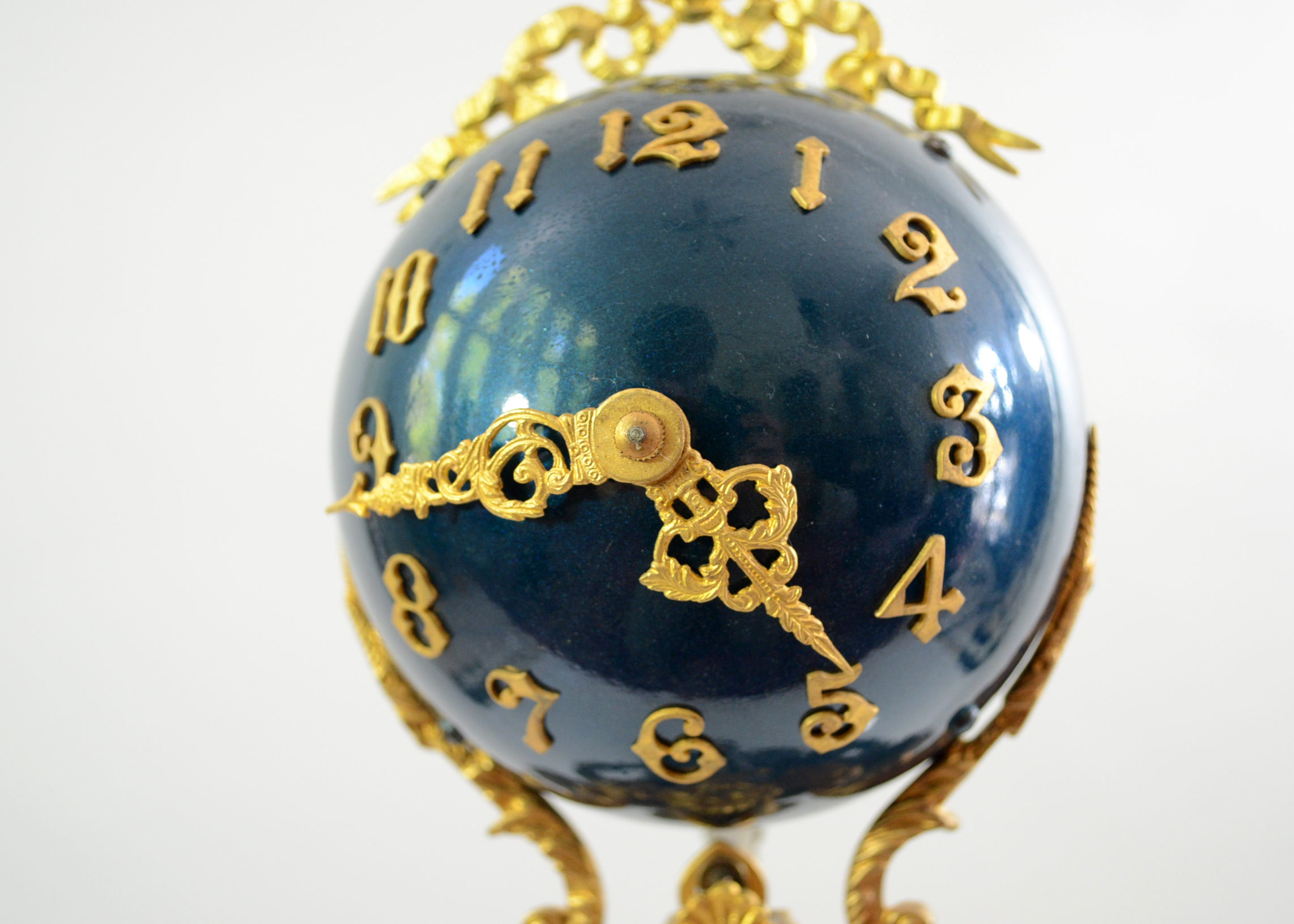 Double Swing Arm Clock Featuring Two Women
