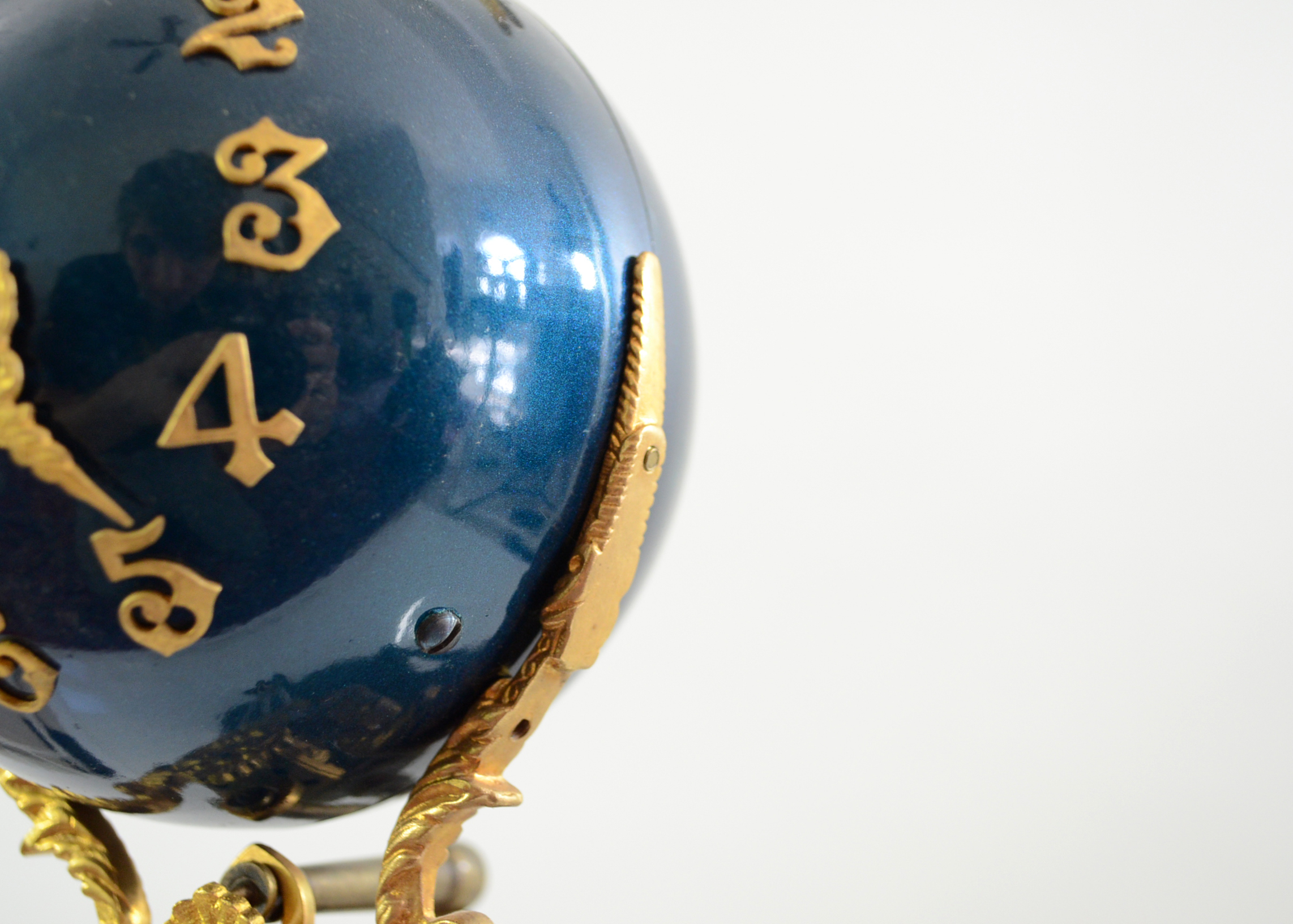 Double Swing Arm Clock Featuring Two Women