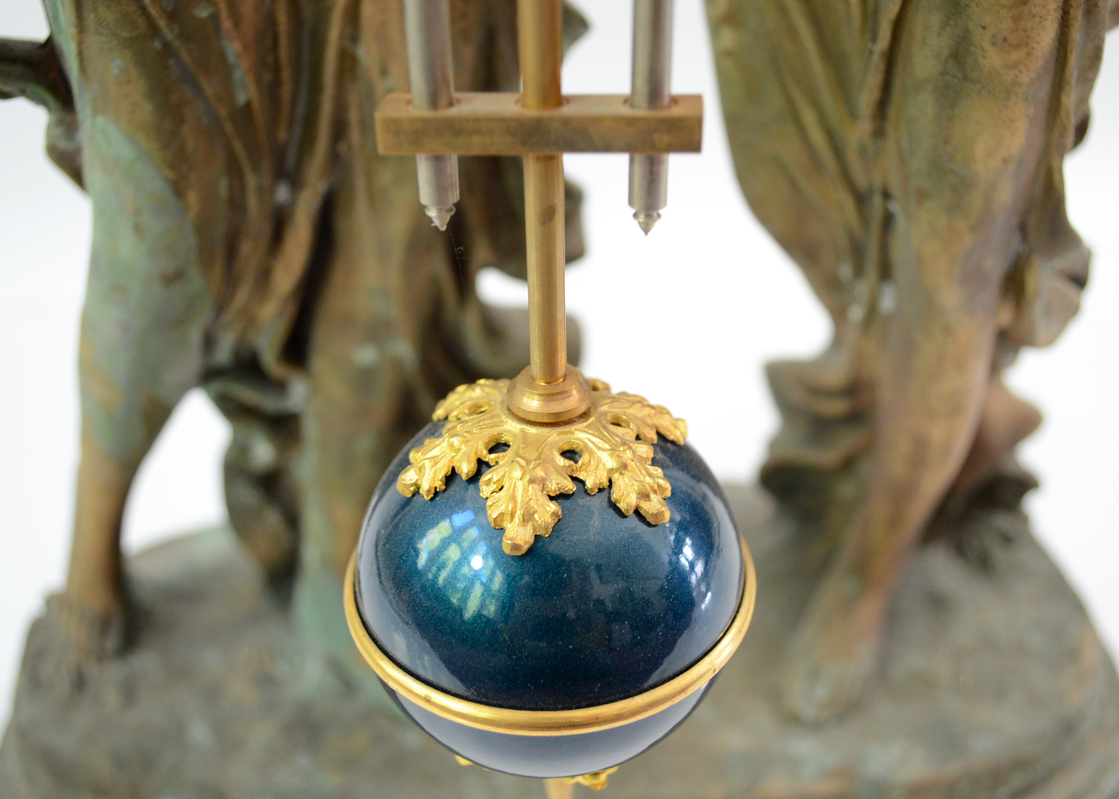 Double Swing Arm Clock Featuring Two Women