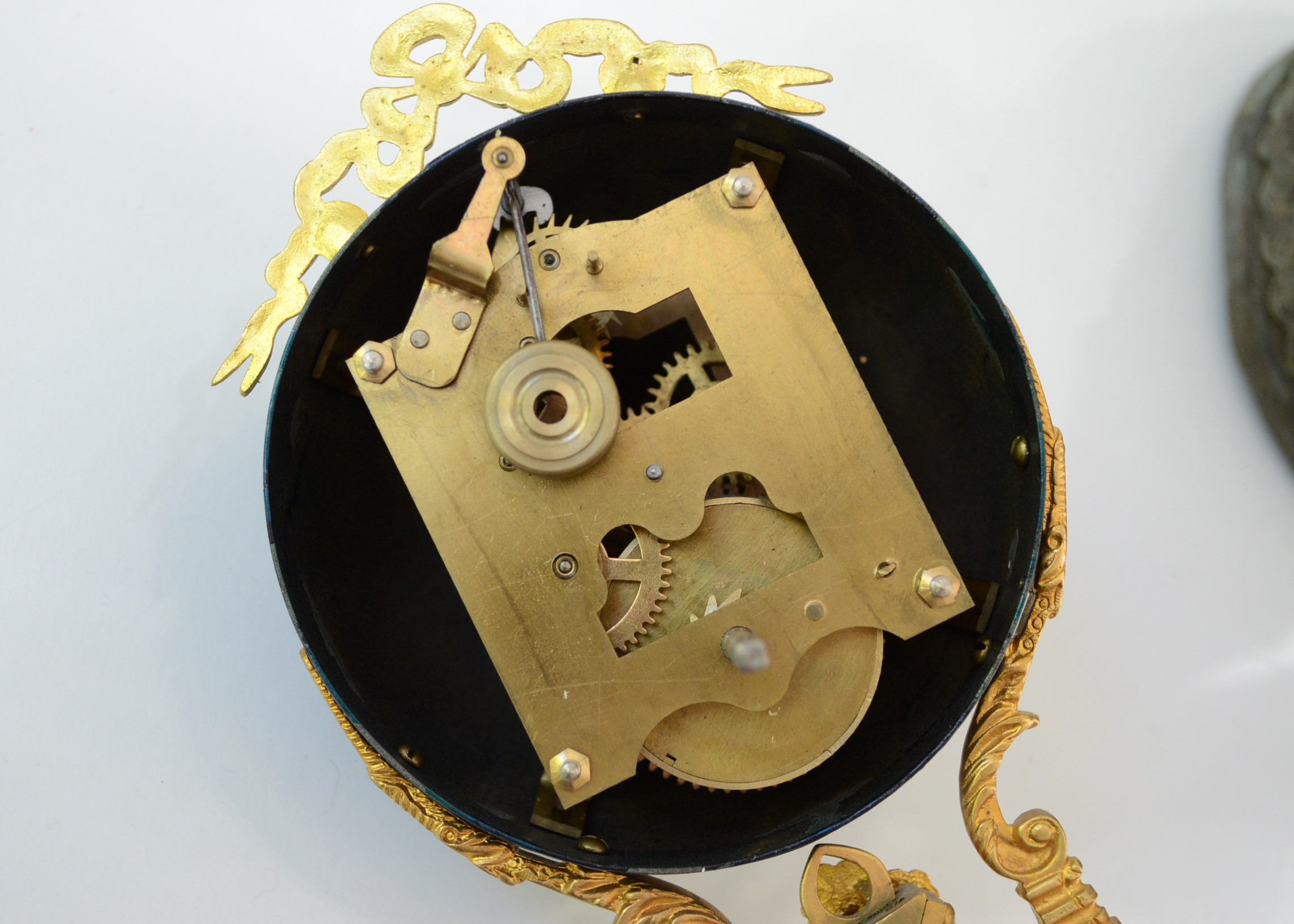 Double Swing Arm Clock Featuring Two Women