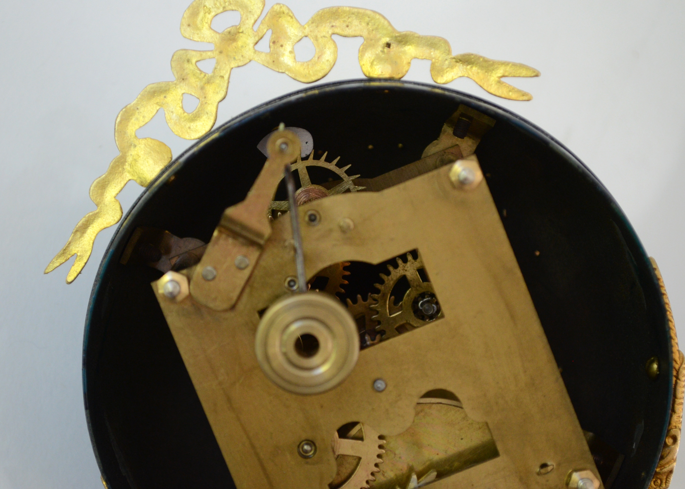 Double Swing Arm Clock Featuring Two Women