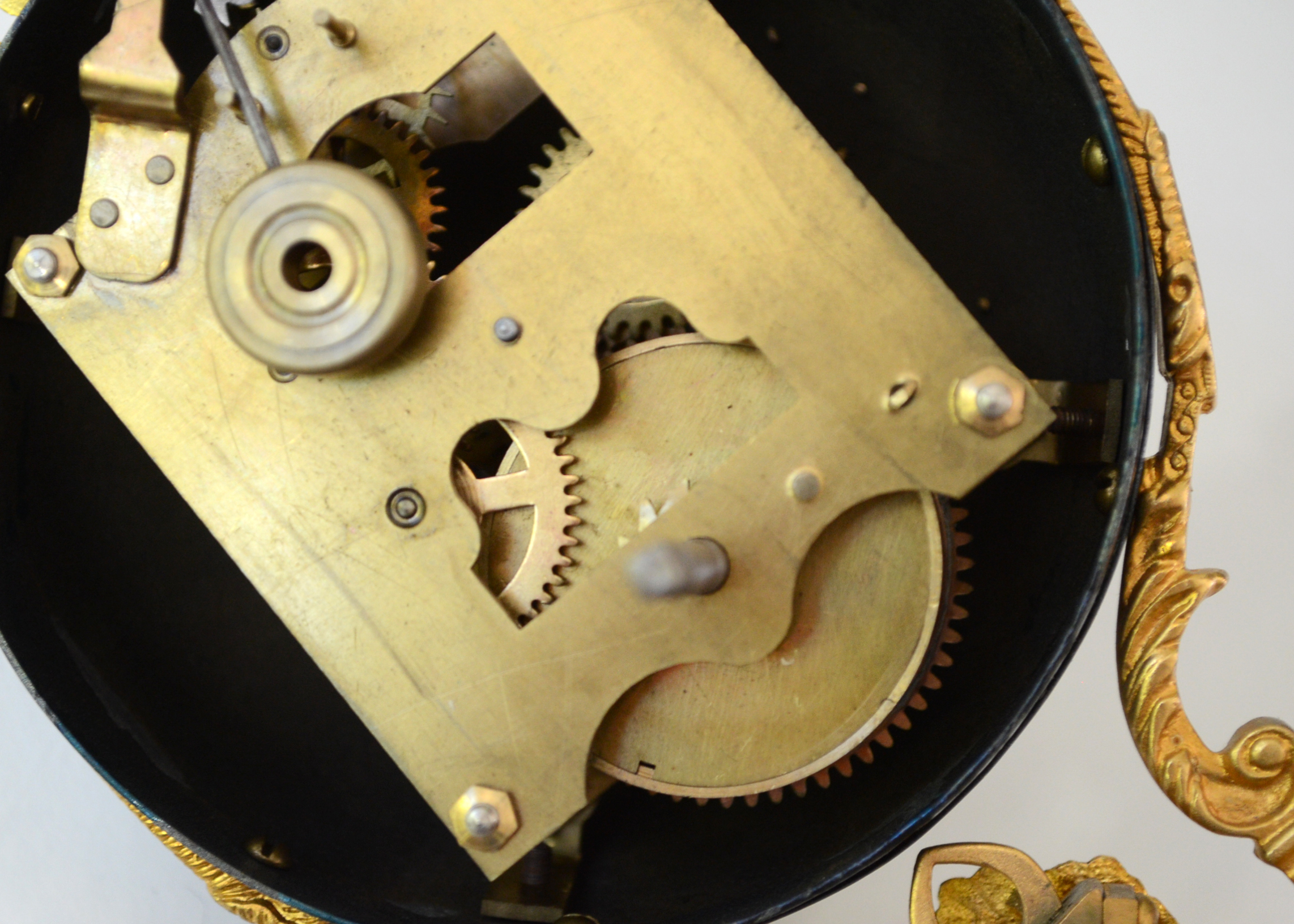 Double Swing Arm Clock Featuring Two Women