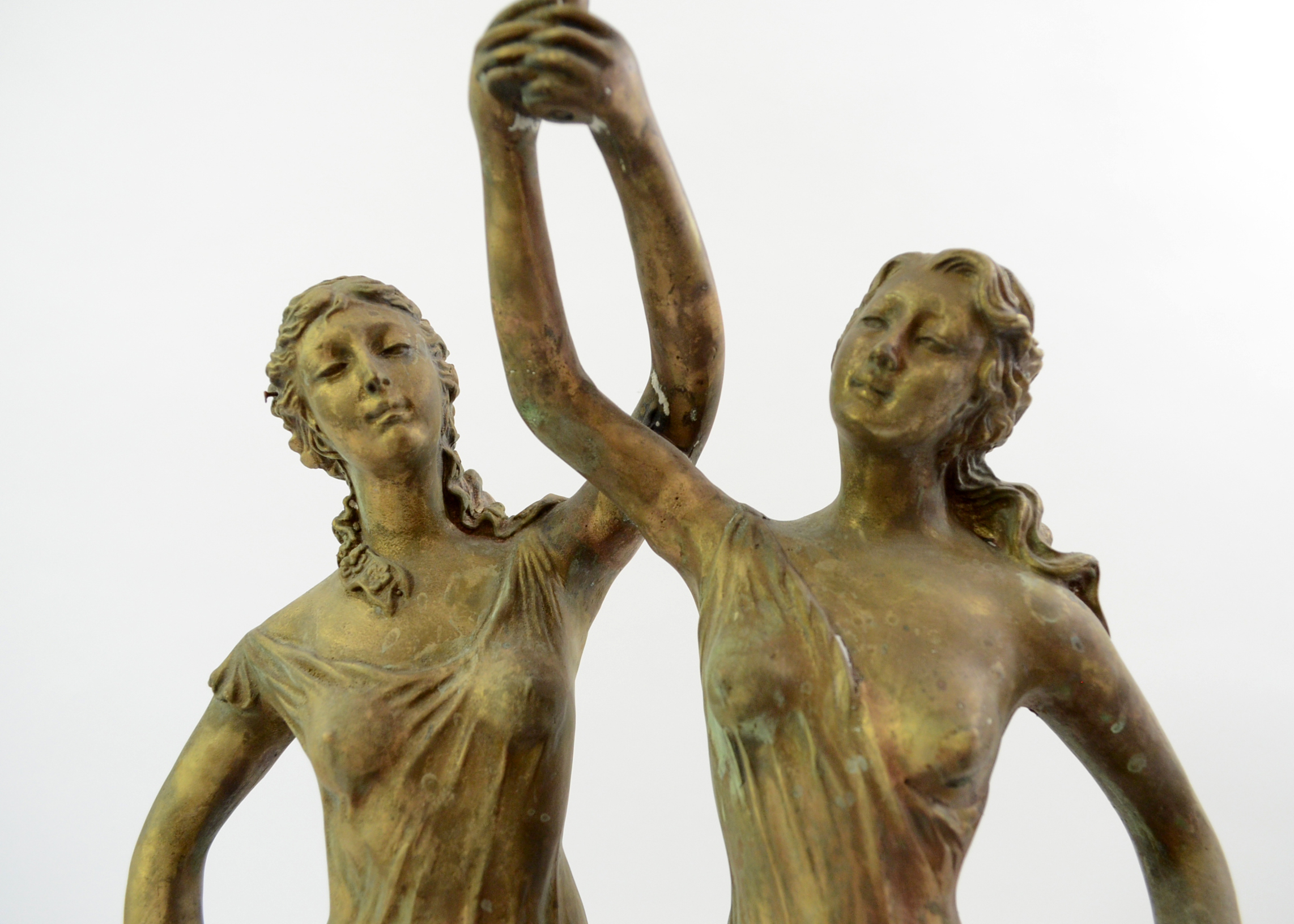 Double Swing Arm Clock Featuring Two Women