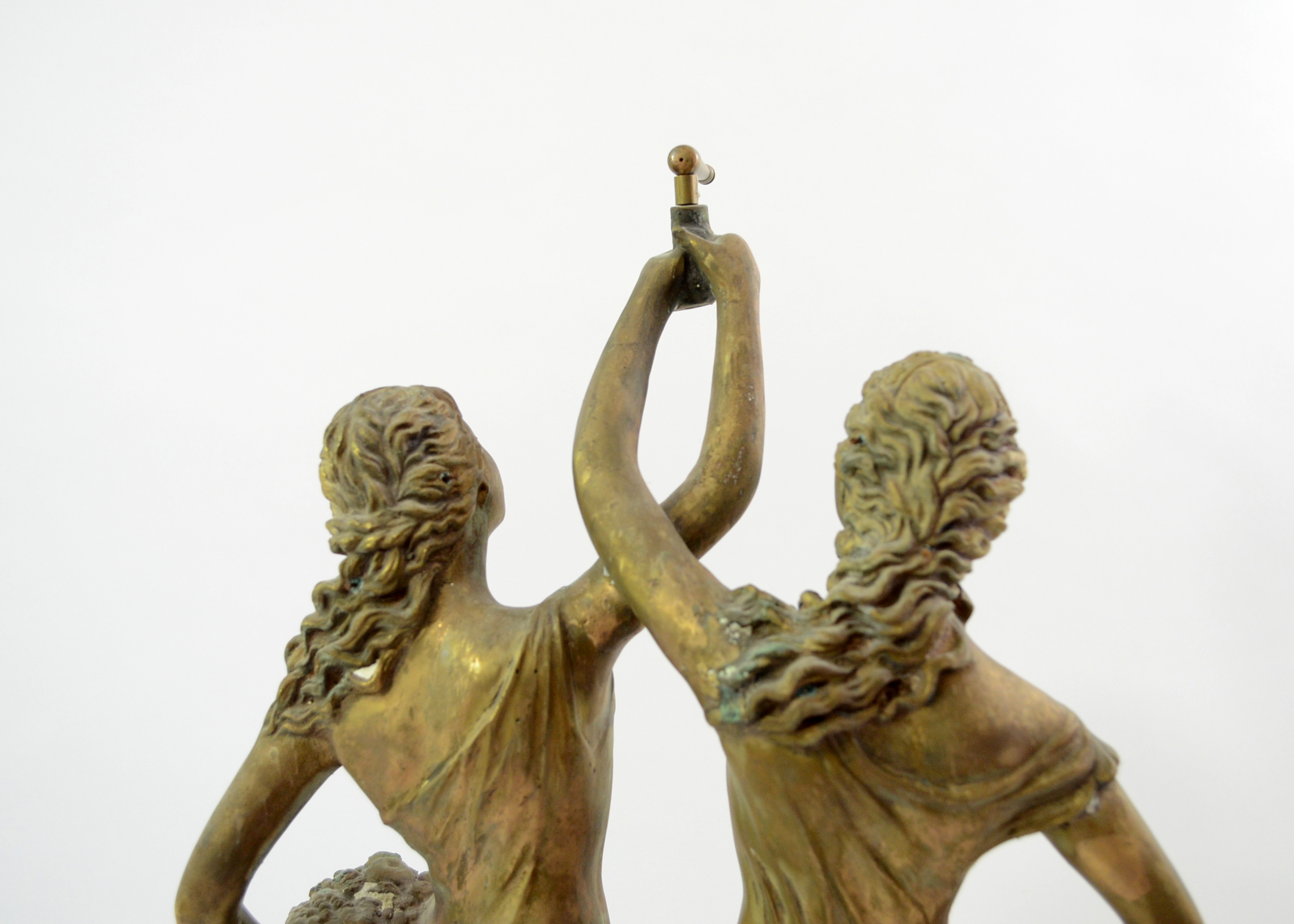 Double Swing Arm Clock Featuring Two Women