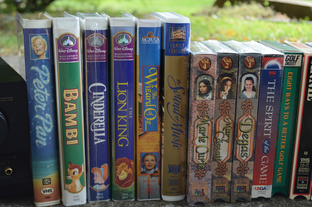 VHS Tape Players and Collection of Vintage VHS Tapes