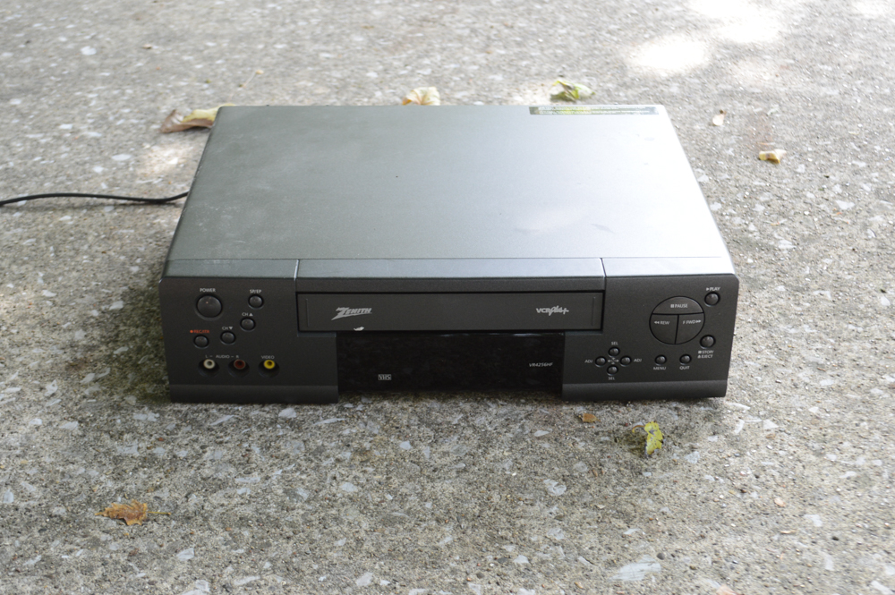 VHS Tape Players and Collection of Vintage VHS Tapes