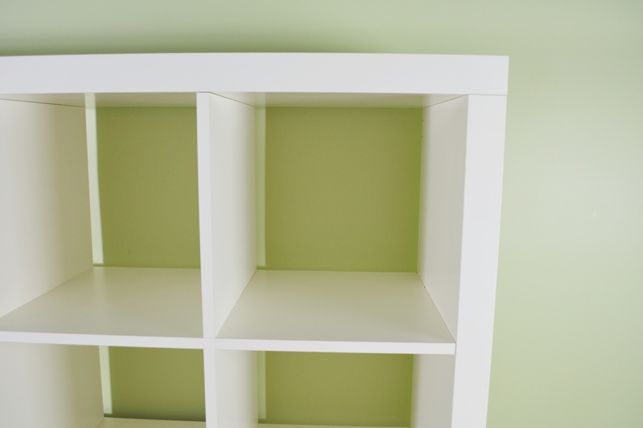 White Laminate Sixteen Compartment Open Back Shelving Unit