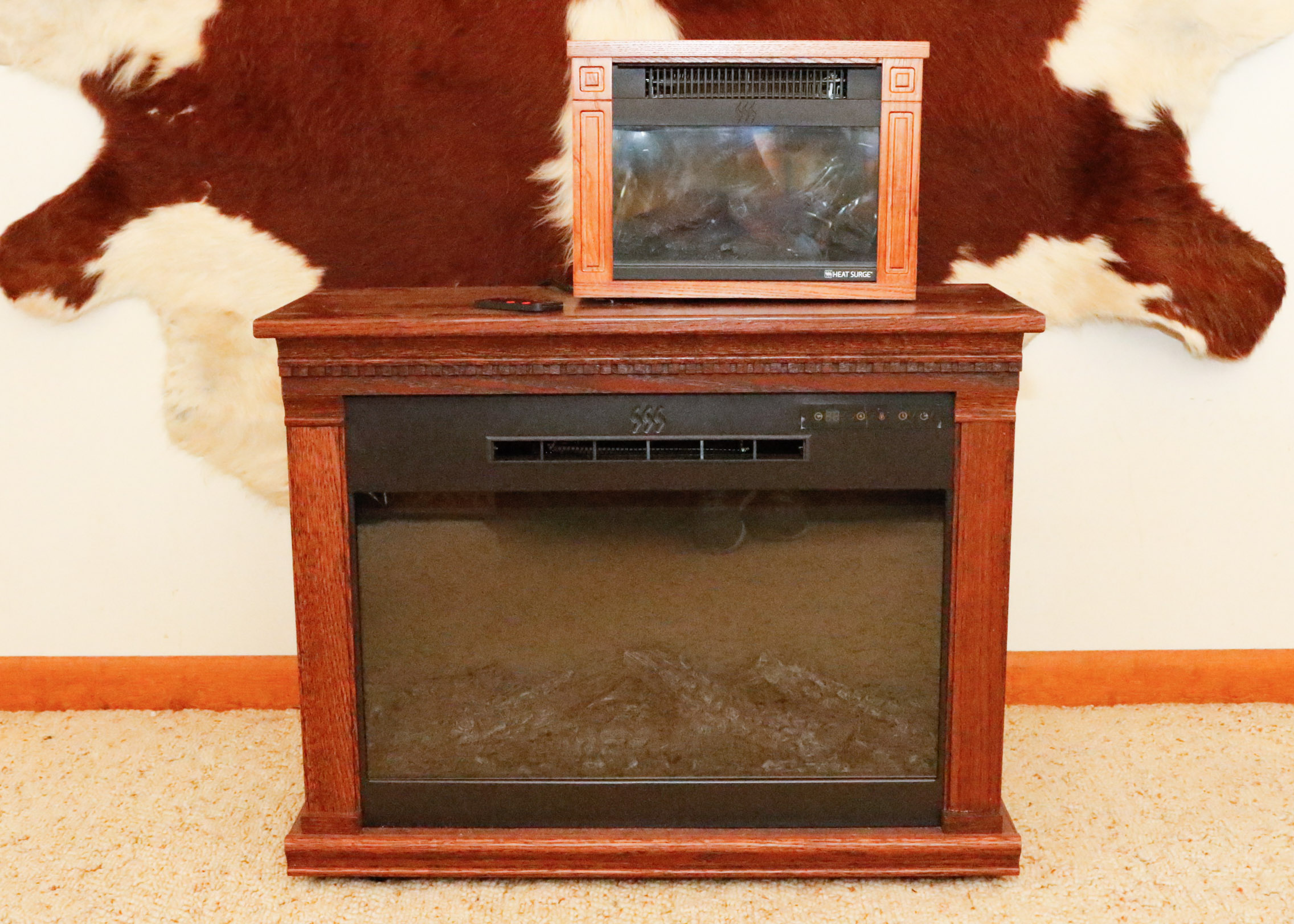 Two Heat Surge Electric Fireplace Units