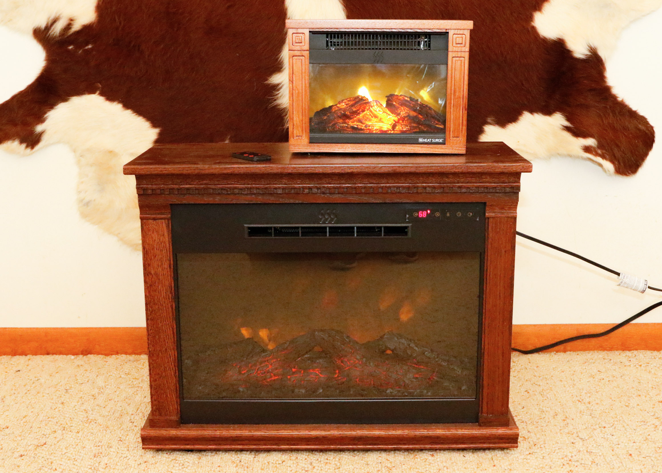 Two Heat Surge Electric Fireplace Units